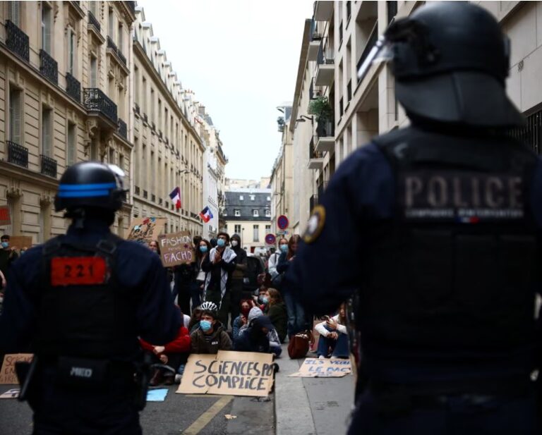 French police suspend use of stun grenades after high-school protester loses hand