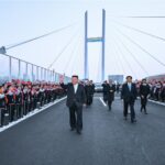 Kim Jong-un crosses newly opened bridge into China